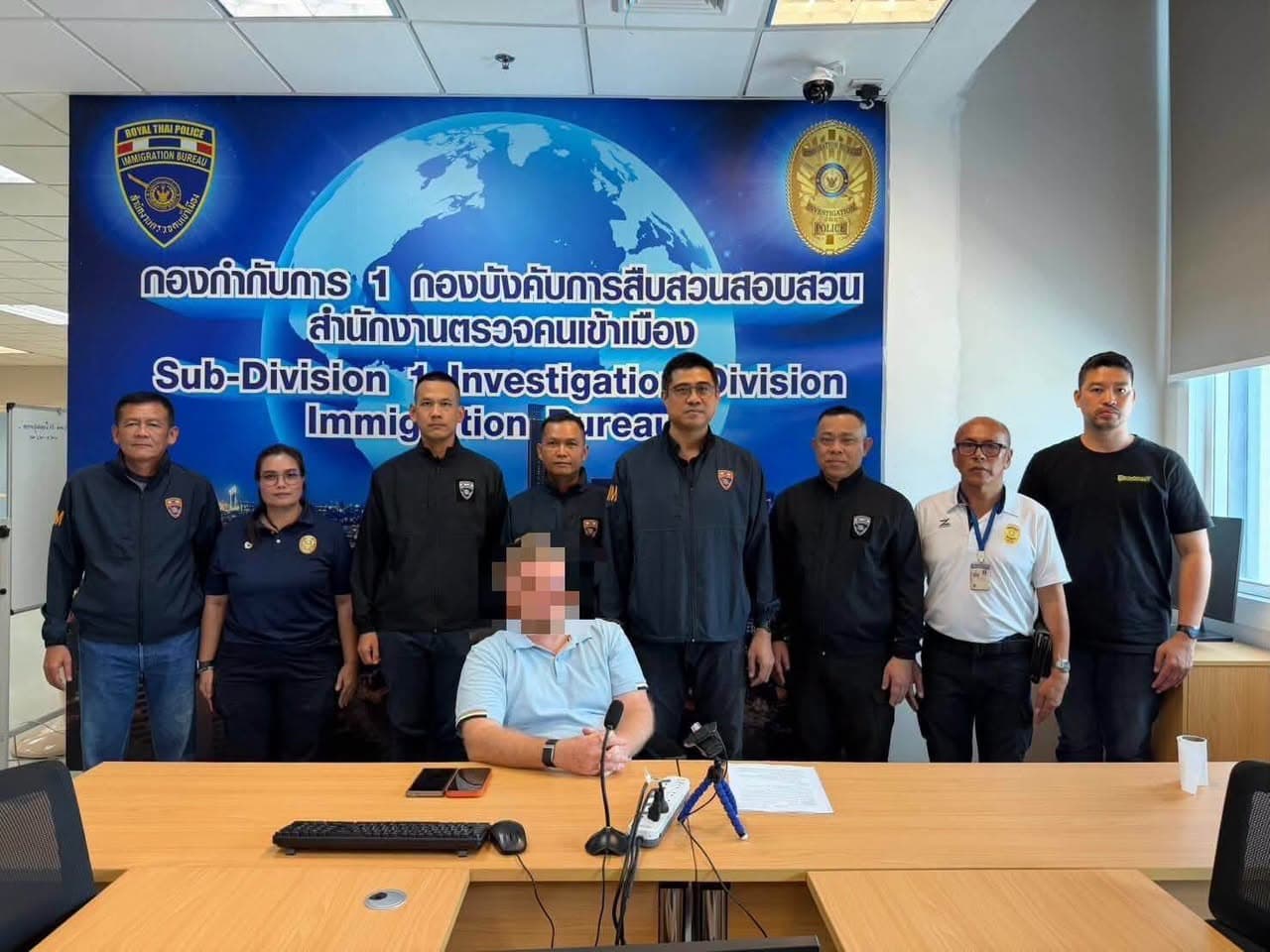 Immigration Police Arrest American Wanted for $4 Million Fraud Case at Luxury Bangkok Condo
